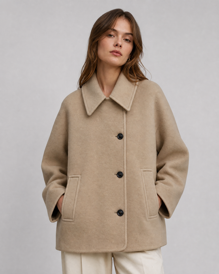 Chic brown women's short coat for elegant fall and winter layering. Stylish outerwear.