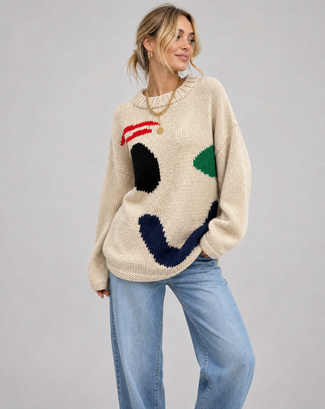 Women's oversized cozy smiley face knit cardigan sweater, perfect for trendy fall fashion & casual layering.