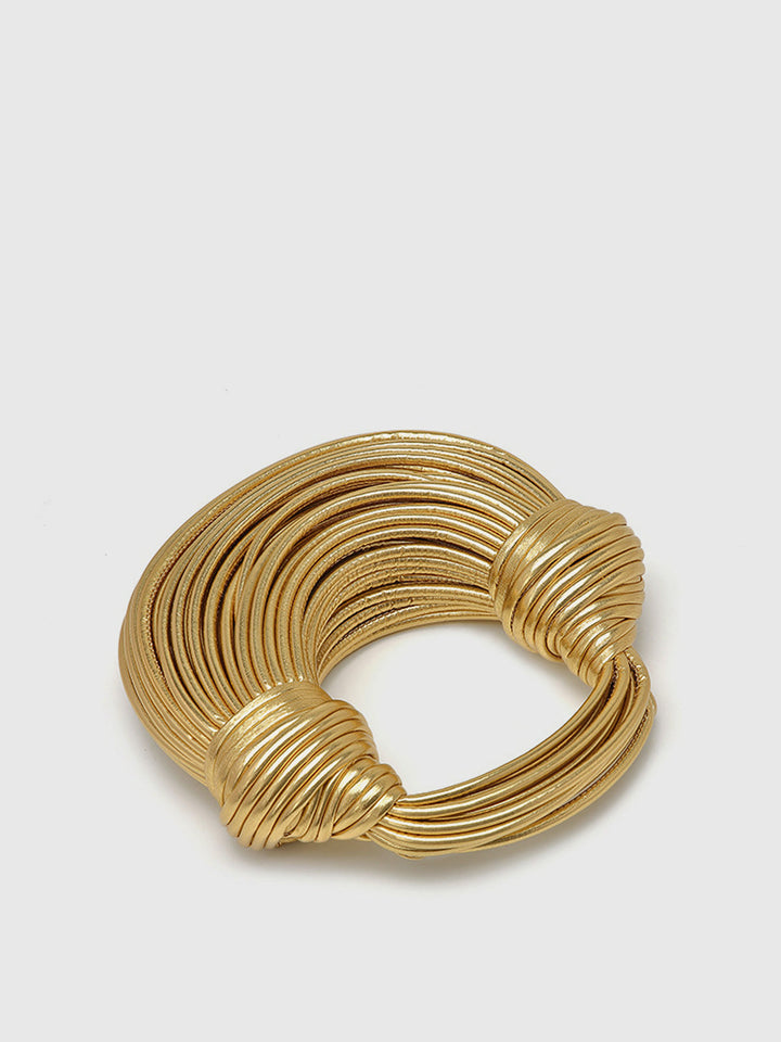 Women's versatile gold twisted hoop handbag. Chic polyurethane elegant bag, a must-have fashion accessory.