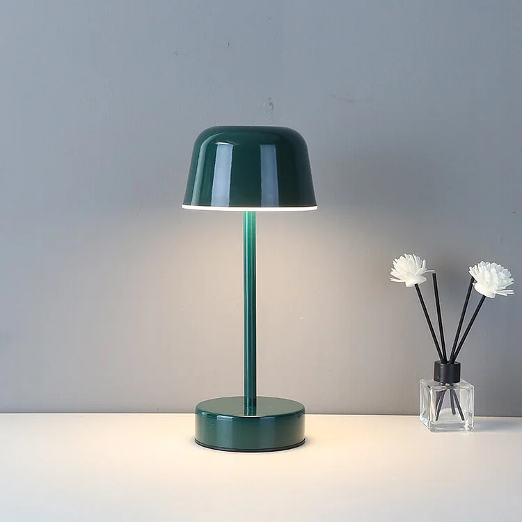 Modern LED table lamp, dimmable & cordless, for flexible bedroom or living room lighting.