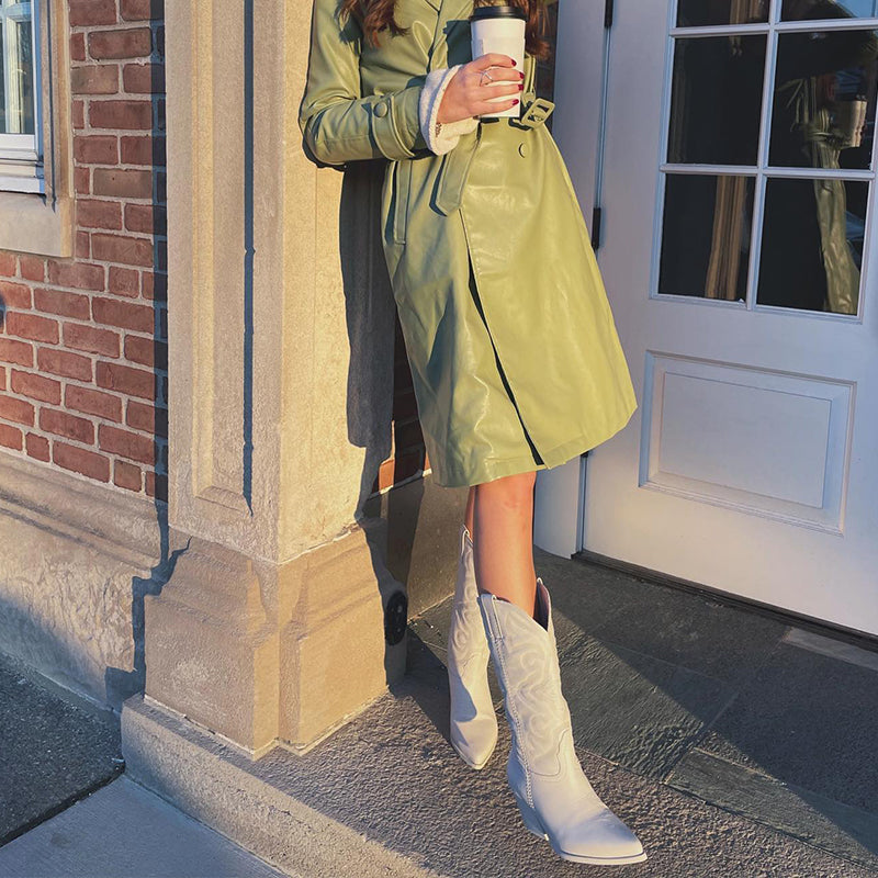 Metallic cowgirl boots for women, eye-catching western style footwear for festivals.