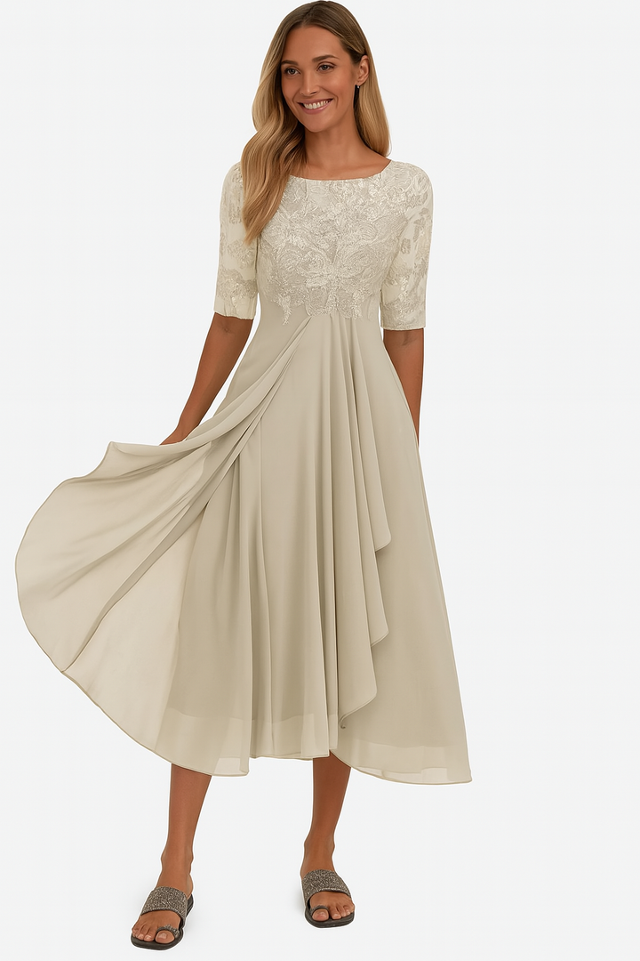 Women's A-line midi dress with three-quarter sleeves, comfortable & elegant for summer events.