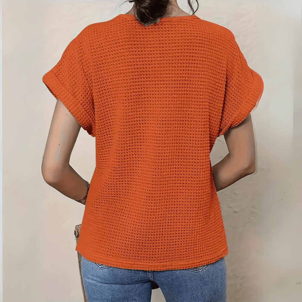 Classic women's vintage top with beautiful lace detailing, offering an elegant & chic style.