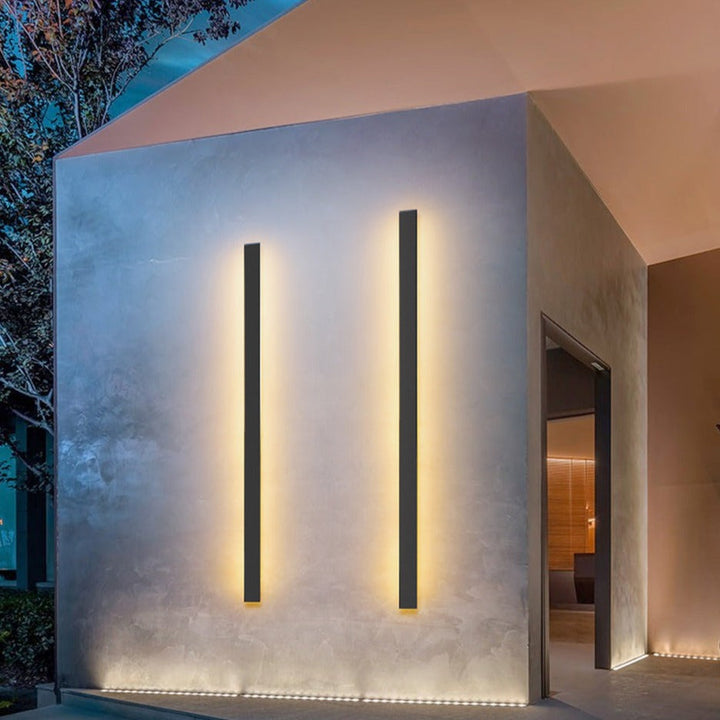 Architectural LED outdoor wall sconce with linear design, perfect for modern home accent lighting.
