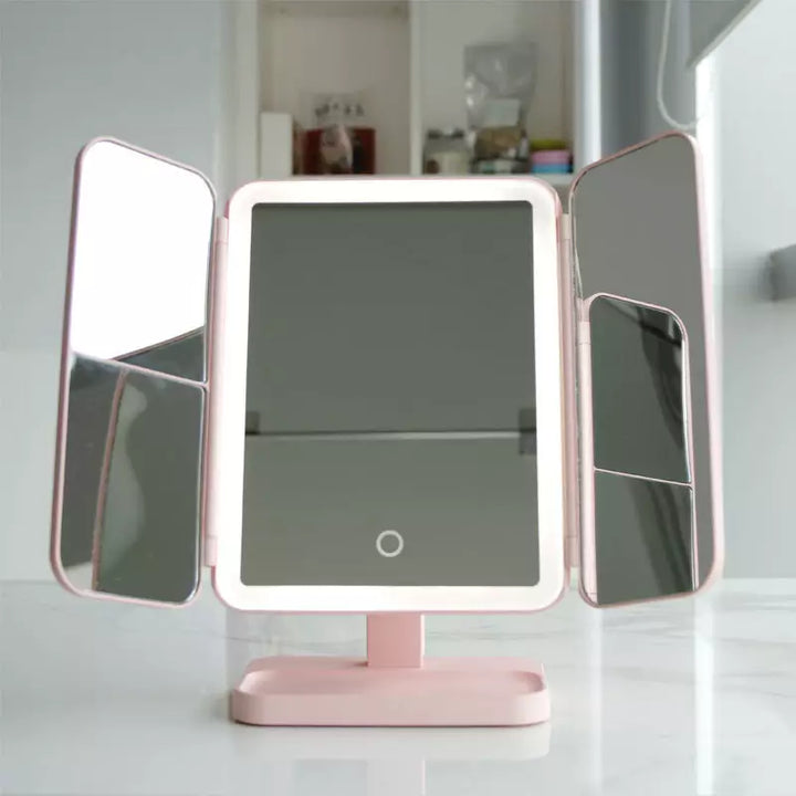 Women's beauty vanity mirror: LED lights, triple brightness, & magnifying mirror for flawless make-up.