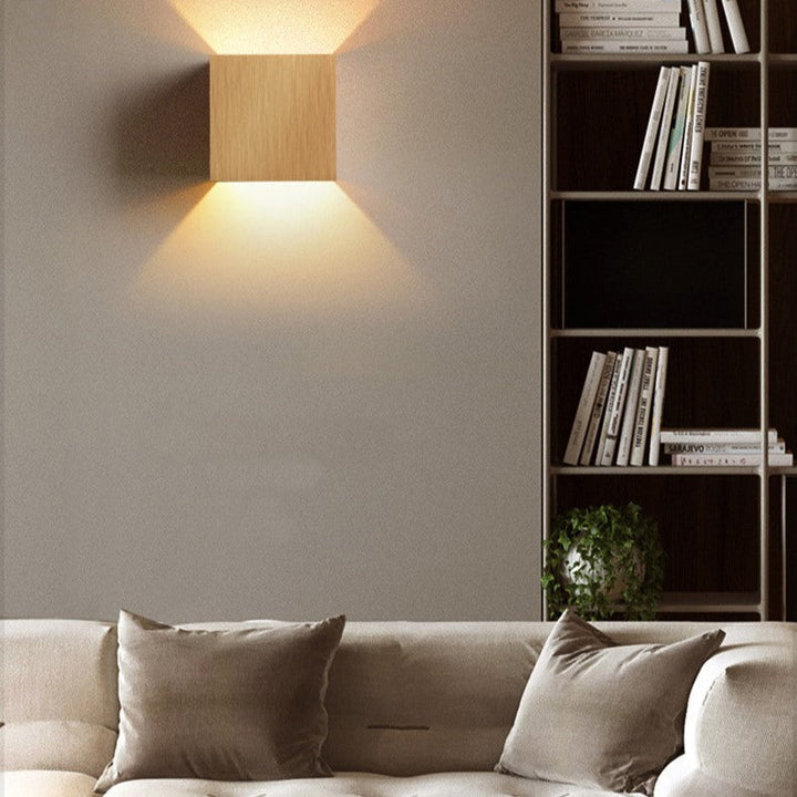 Up/down modern LED wall sconce. Energy-efficient accent lighting fixture for contemporary indoor design.