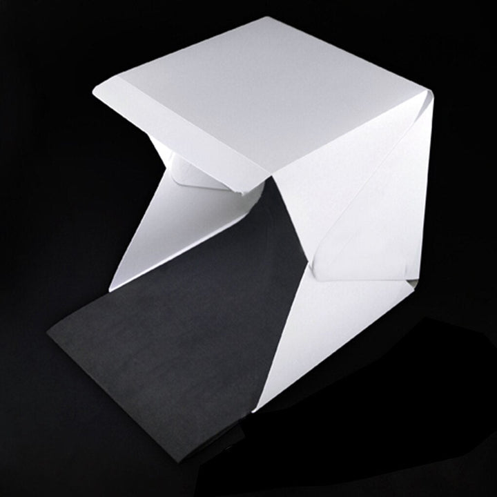 Compact product photo studio kit with integrated LED lights, perfect for small business & online sellers.