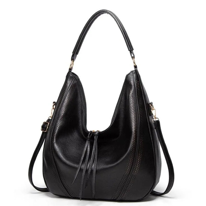 Stylish women's vintage leather crossbody bag, an organized everyday handbag with a classic, versatile design.