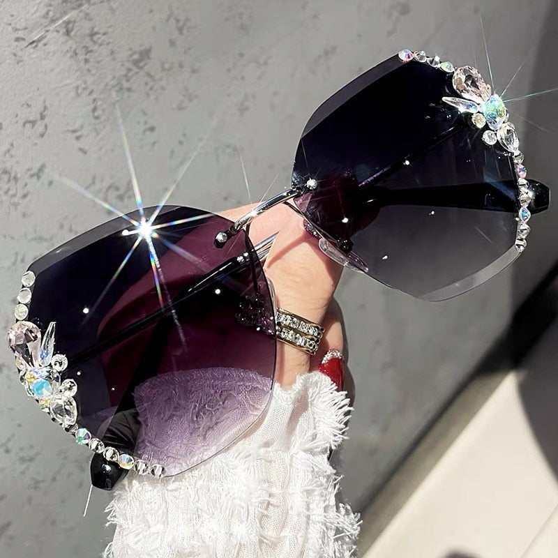 Women's rimless sunglasses, detailed with rhinestones and a stylish gold frame for a chic look.