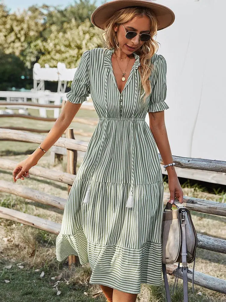 Comfortable and flowy women's casual dress with a stylish V-neck and delicate ruffles, ideal for day wear.
