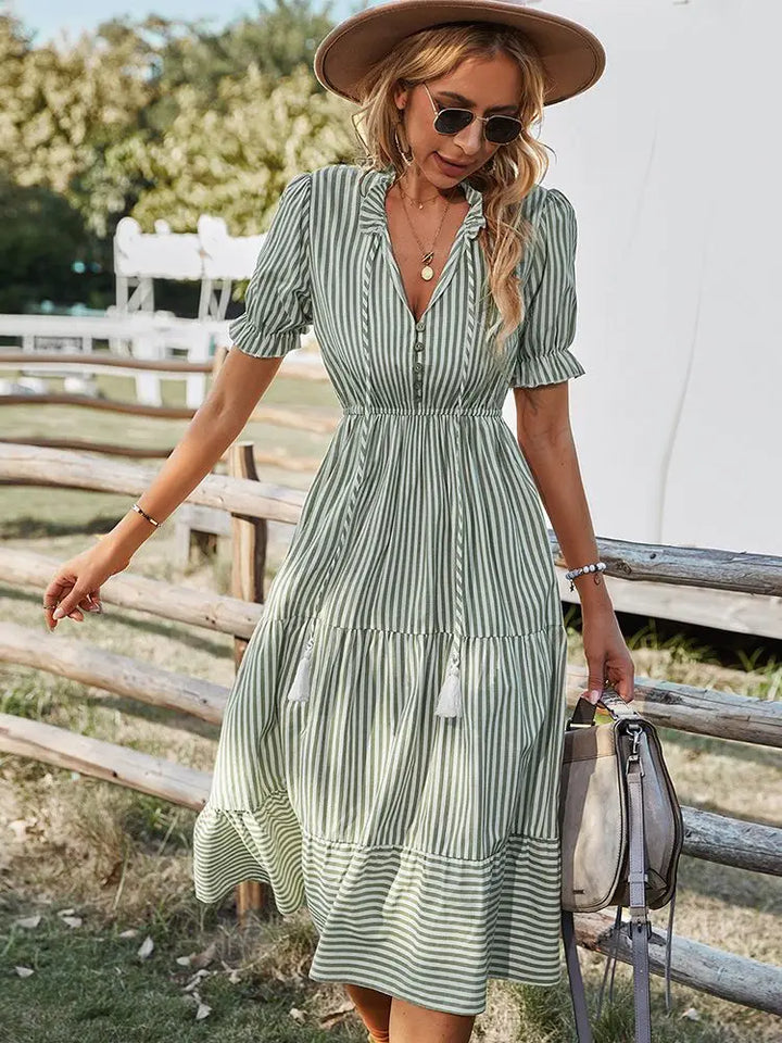 Comfortable and flowy women's casual dress with a stylish V-neck and delicate ruffles, ideal for day wear.