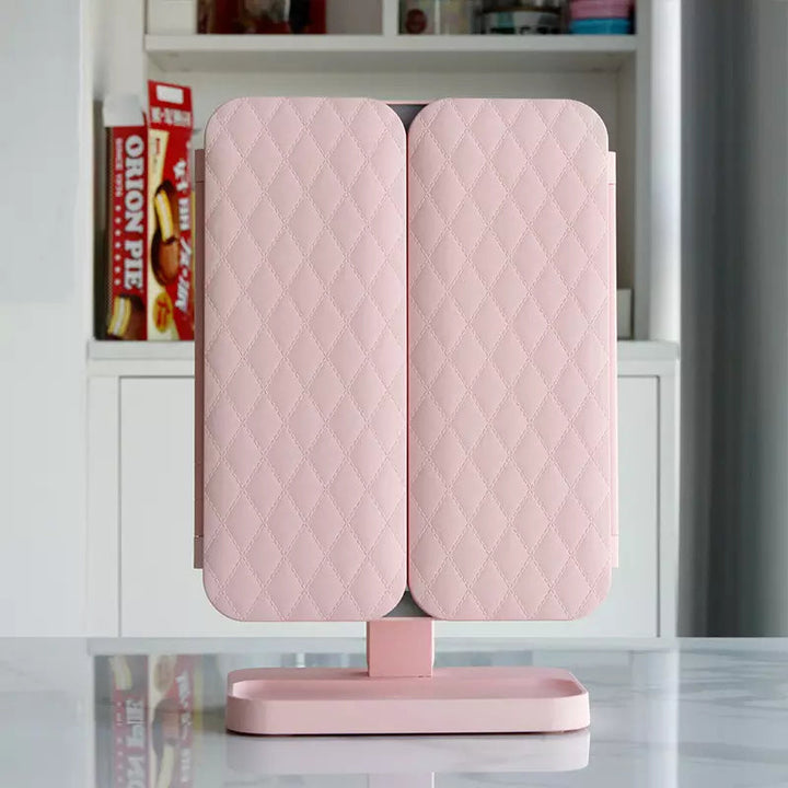 Portable LED make-up mirror, USB rechargeable, with adjustable triple lighting & magnifying panel.