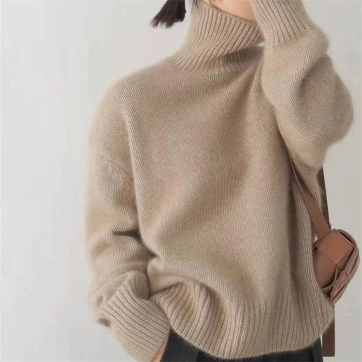 Chic women's oversized turtleneck sweater, fall style, cozy knit, perfect for daily wear.