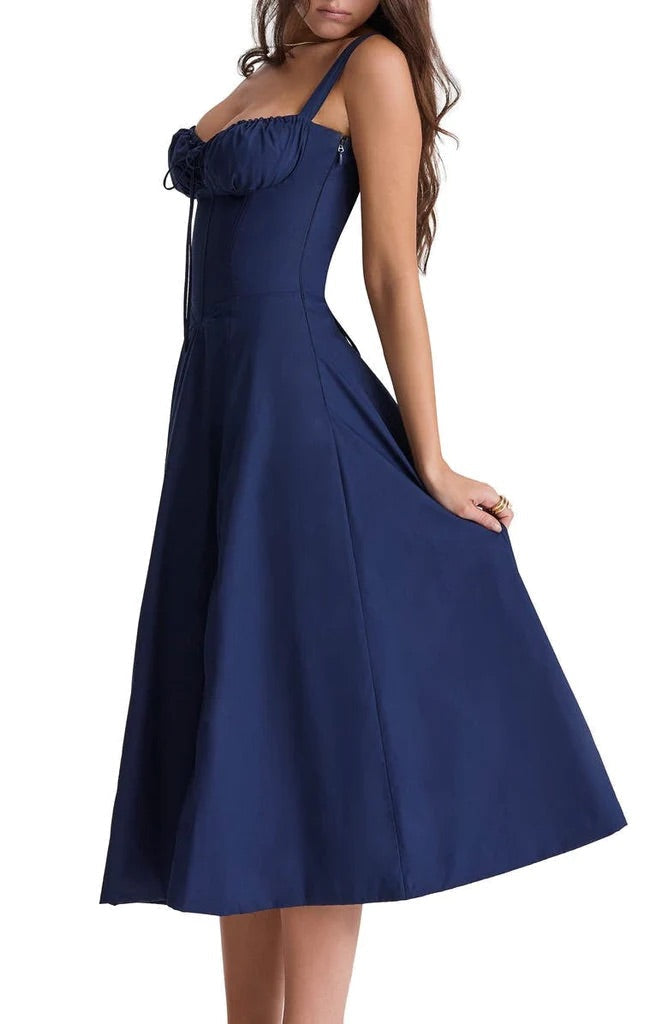 Fitted women's bustier midi dress, floral blossom print, sweetheart neckline for summer occasions.
