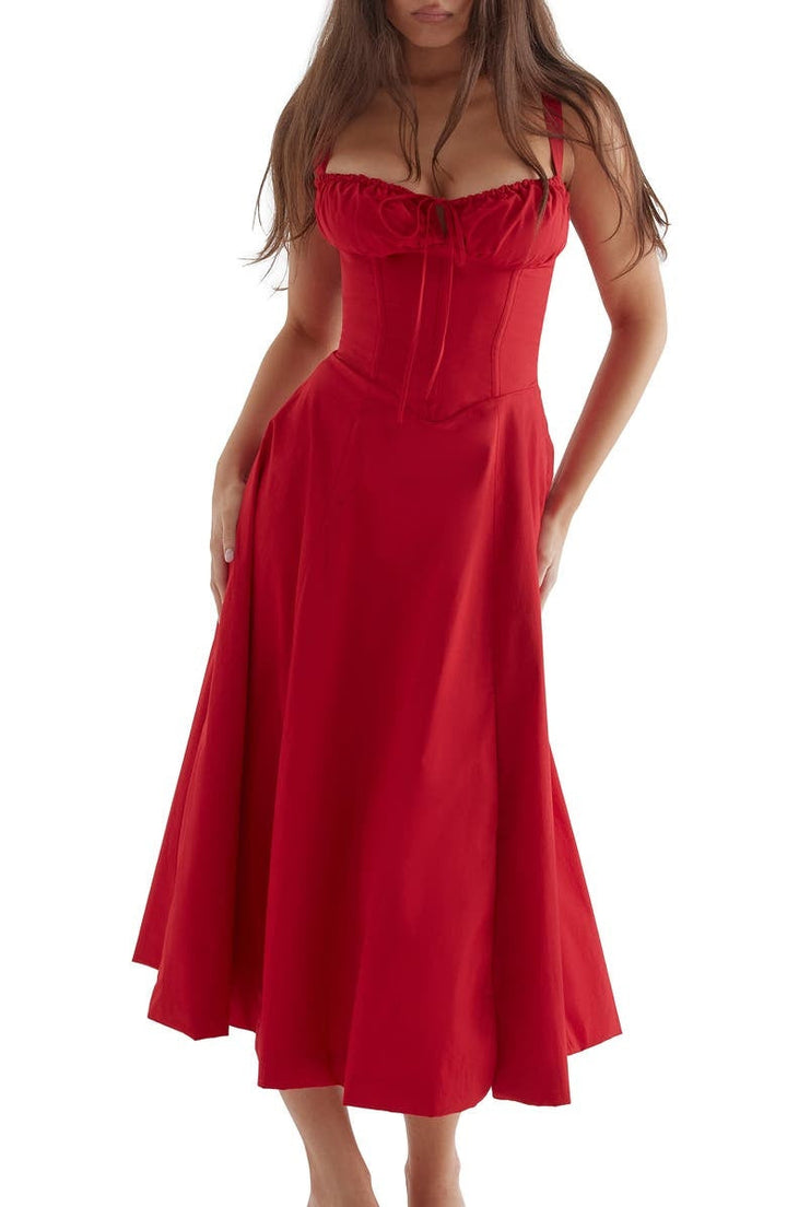 Women's elegant floral dress, bustier midi style with blossom print, ideal for summer parties.