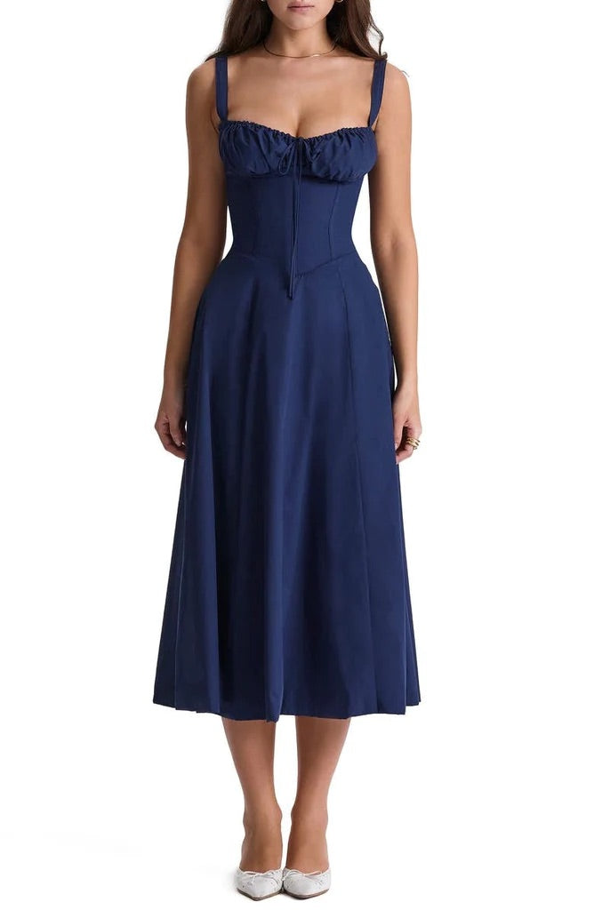 Elegant women's sleeveless floral dress, bustier midi style with a lovely flower print.
