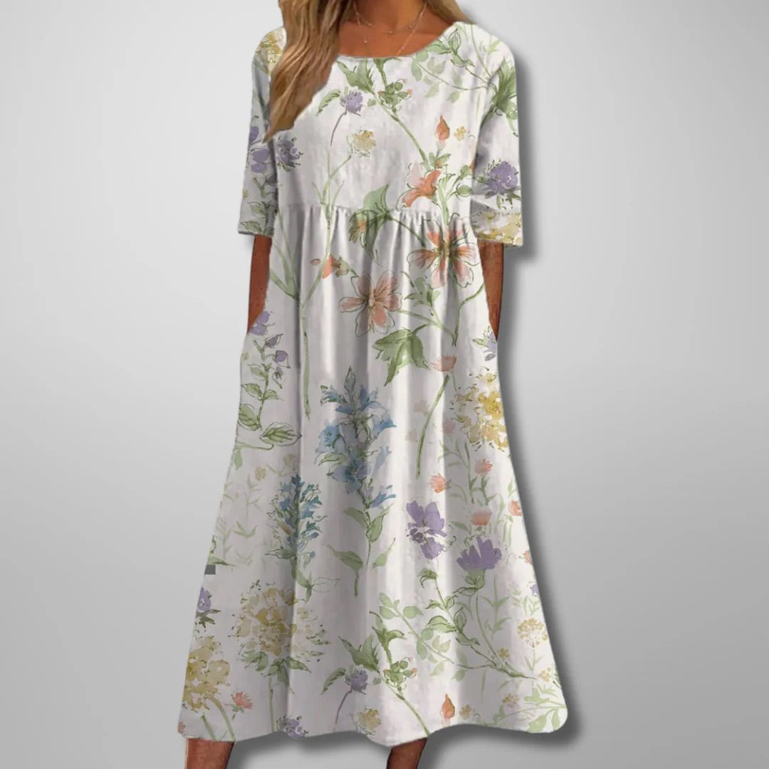 Casual women's floral midi dress. Relaxed fit in navy blue. Ideal for everyday spring & summer comfort & style.