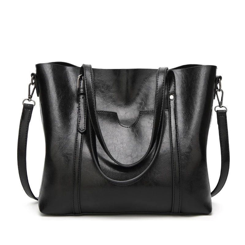 High-quality genuine leather women's crossbody handbag, durable, elegant fashion accessory.
