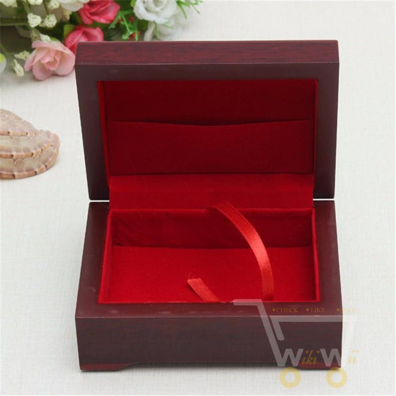 Elegant 24K gold-plated playing cards gift set, presented in a beautifully crafted wooden box. Unique card deck.