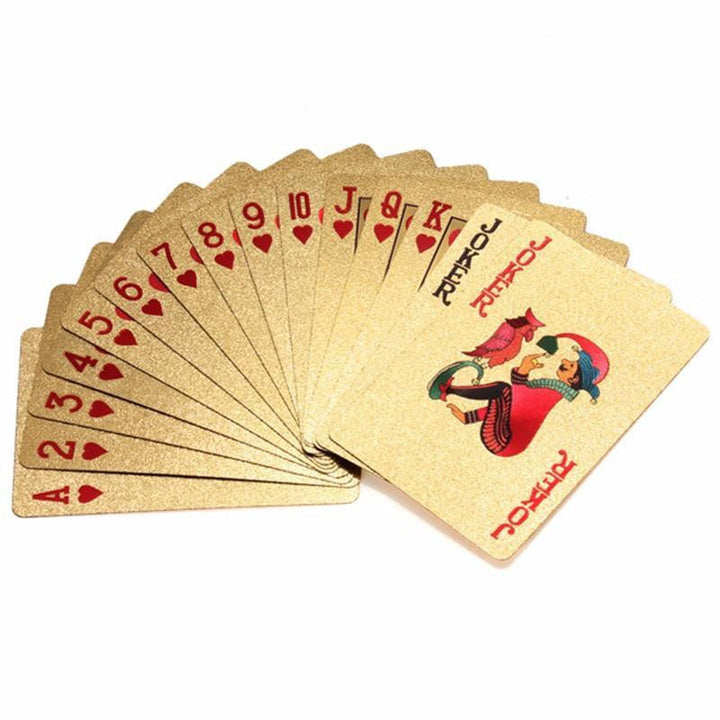 Stack of shimmering 24K gold-plated playing cards, a premium card deck for game night or display.