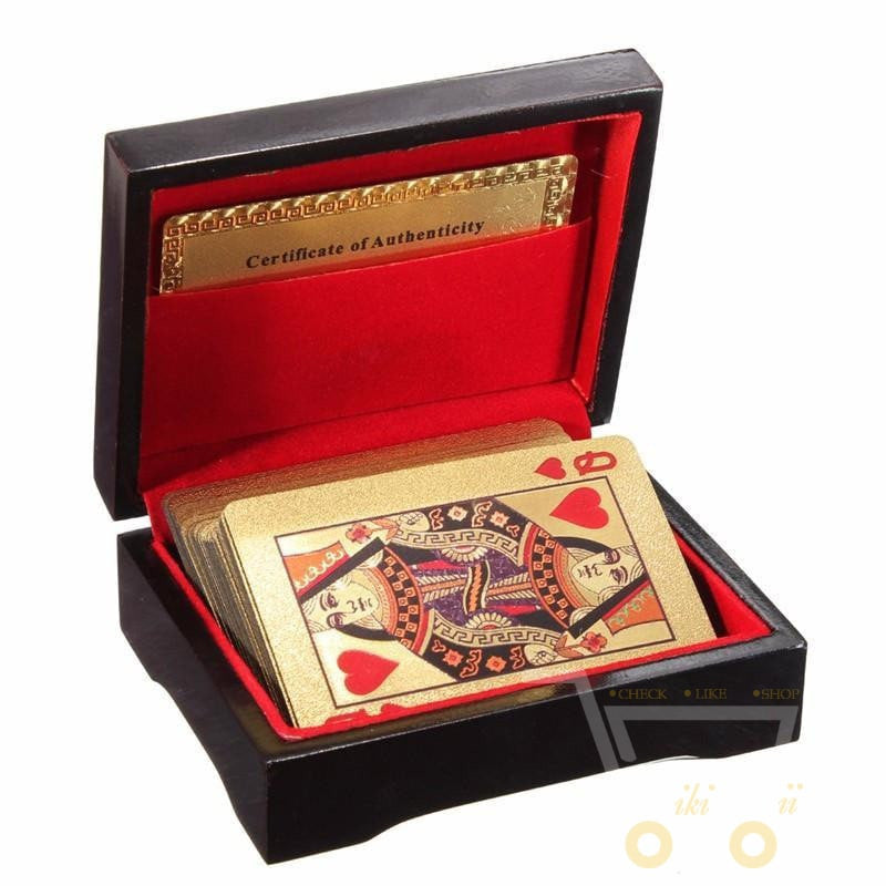 Close-up of intricate 24K gold-plated playing cards, highlighting their unique design and luxurious finish.