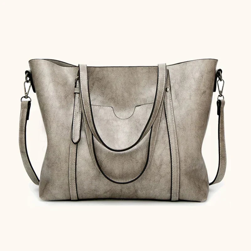 Classic women's luxury leather crossbody handbag, a timeless and elegant fashion statement.