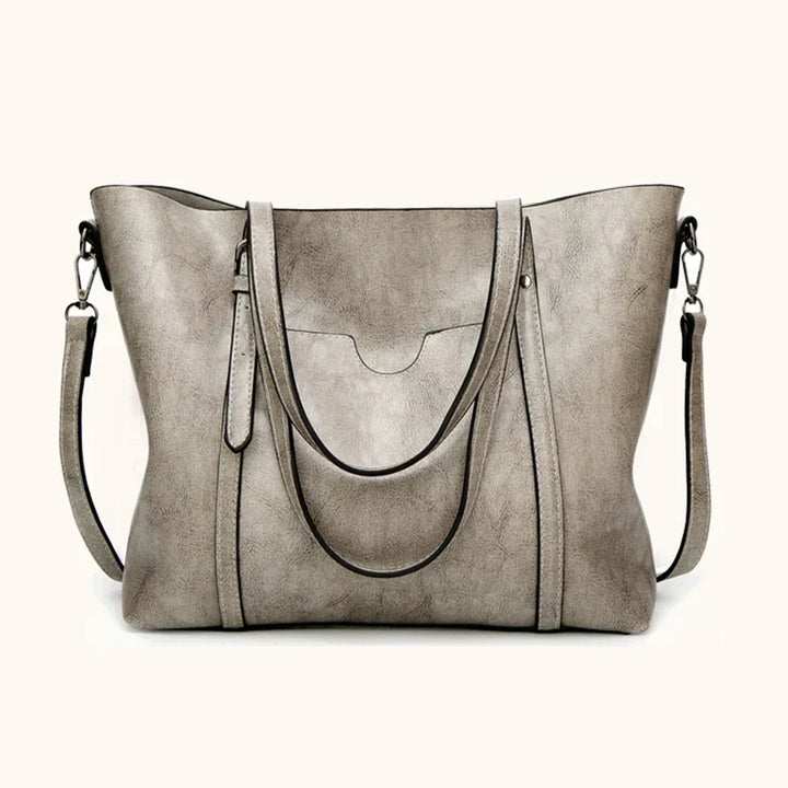 Classic women's luxury leather crossbody handbag, a timeless and elegant fashion statement.
