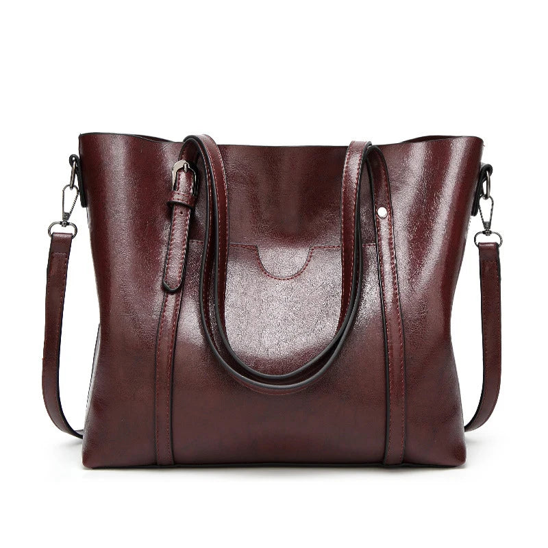 Detailed shot of women's luxury genuine leather shoulder bag, featuring elegant design.
