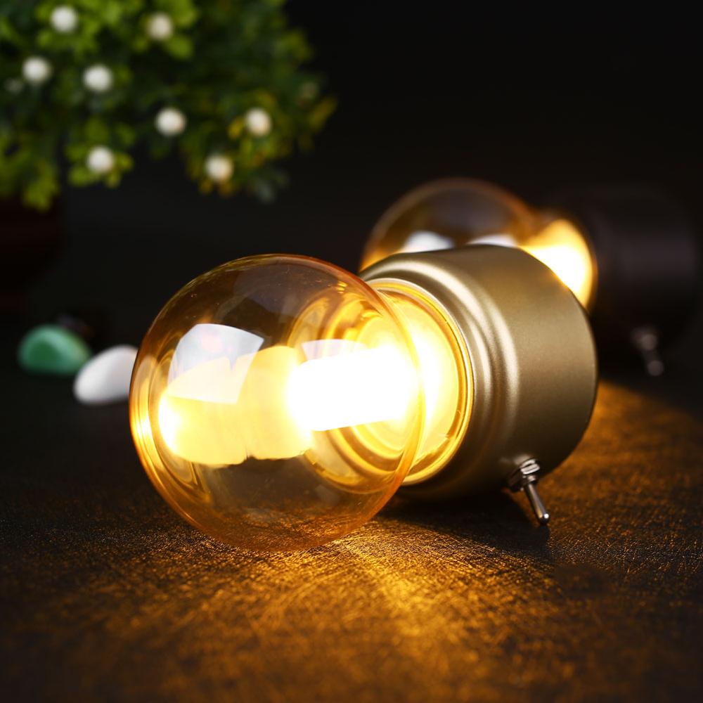 Modern retro LED lamp for desk or table. USB rechargeable with a soft, warm, energy-efficient glow.