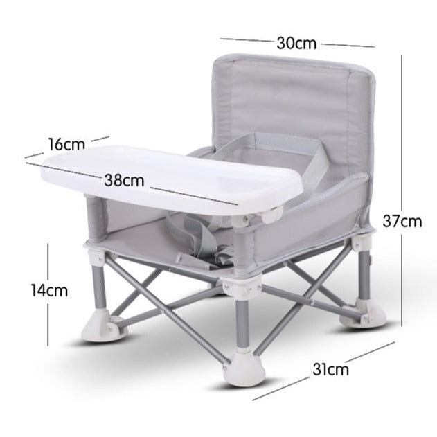 AdventureNest children's folding chair with safety belt & activity tray, ideal for travel.