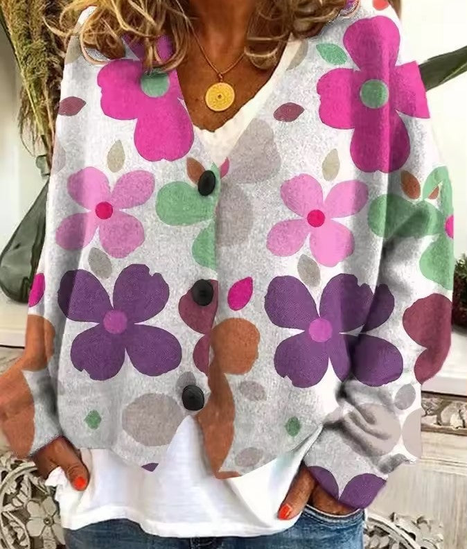 Oversized women's boho sweater featuring a unique, vibrant colorful knit design. Perfect chic top for casual fashion.