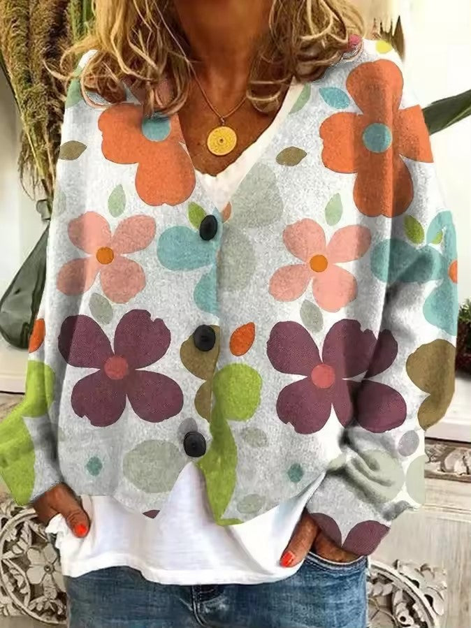 Relaxed fit women's colorful knit sweater, featuring a stylish Bohemian ethnic pattern. Ideal for comfortable casual wear.