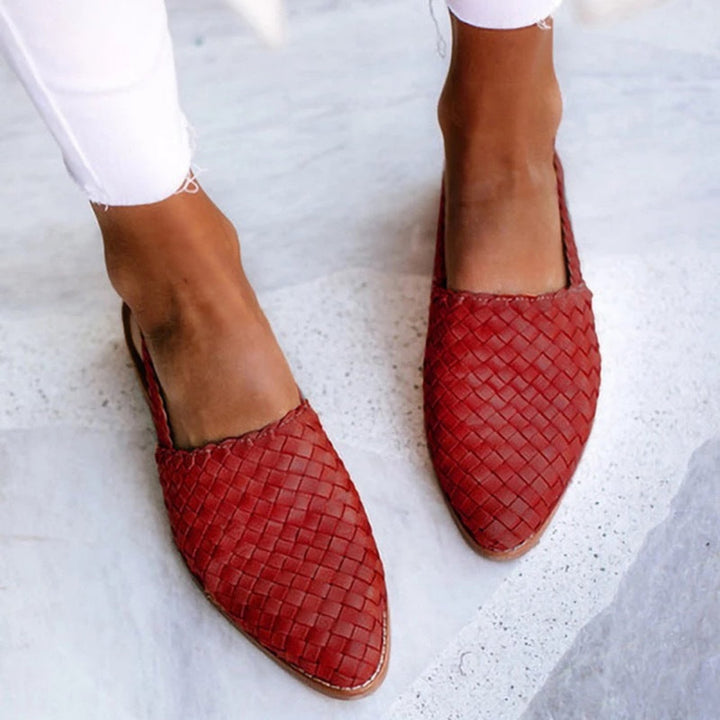 Women's stylish woven slingback sandals with a sophisticated pointed toe design, ideal for elegant summer.