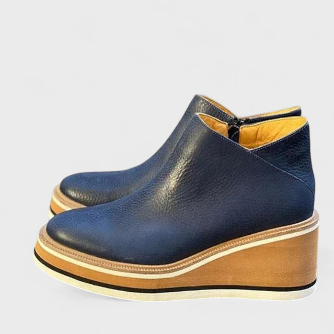 Durable women's waterproof platform ankle boots, keeping feet dry & stylish. Great traction for all weather.