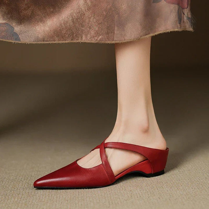 Women's Eloise cross-strap pointed toe slip-on mules. Low heel elegant footwear for comfort.