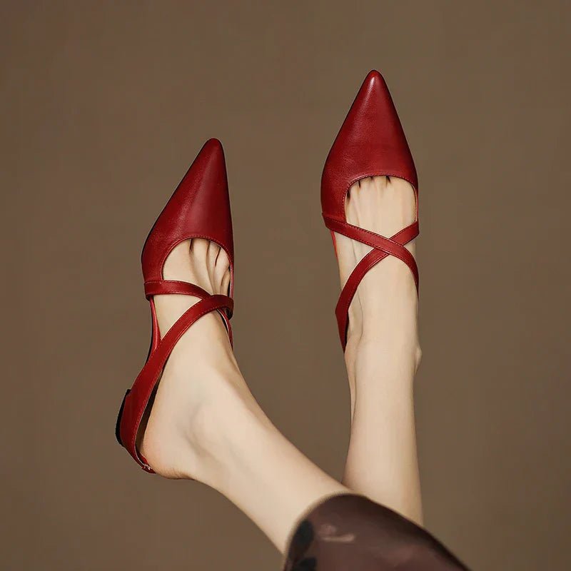 Comfortable Eloise women's mules: pointed toe, cross-strap, low heel. Versatile dress or casual wear.