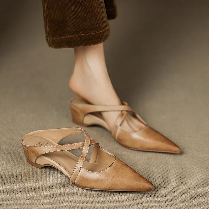 Eloise women's pointed-toe mules, easy slip-on style with fashionable cross-straps and low heel.