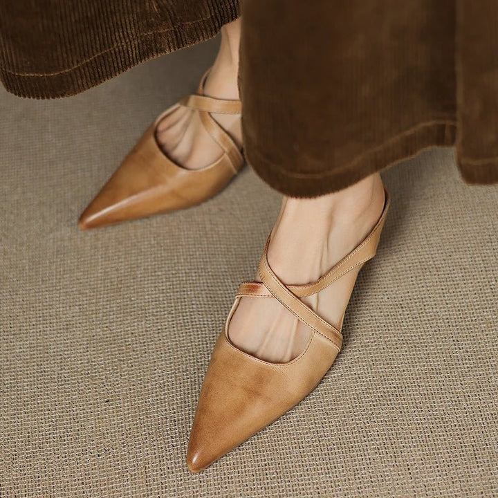 Low-heel women's Eloise mules with stylish cross-straps and a sharp pointed toe. Perfect slip-on shoes.