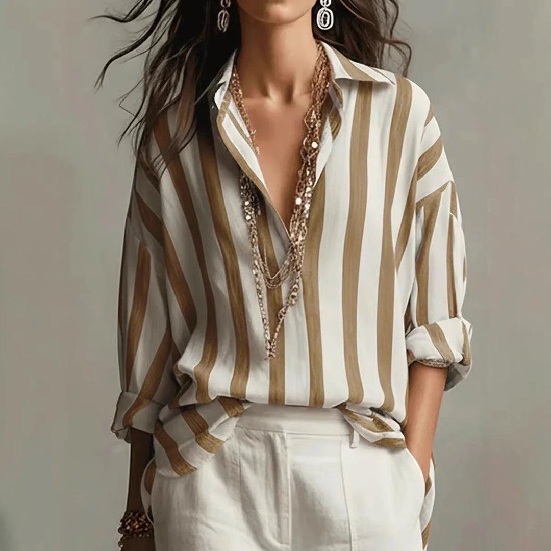 Relaxed fit women's vertical striped blouse with an open collar. Versatile for business casual, office, or everyday elegance.