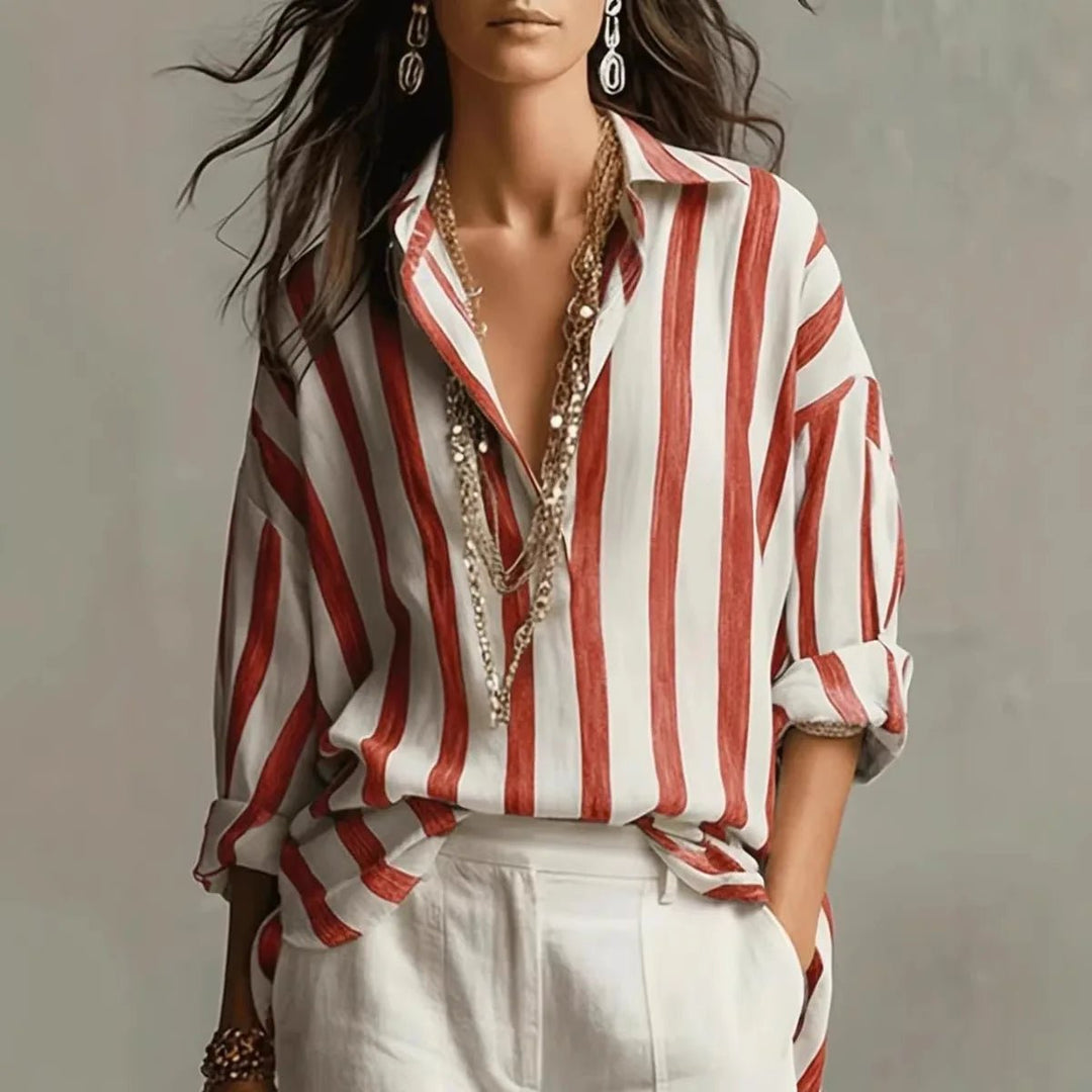 Elegant women's blouse featuring a vertical stripe pattern, stylish open collar, and long sleeves. Chic smart casual top.