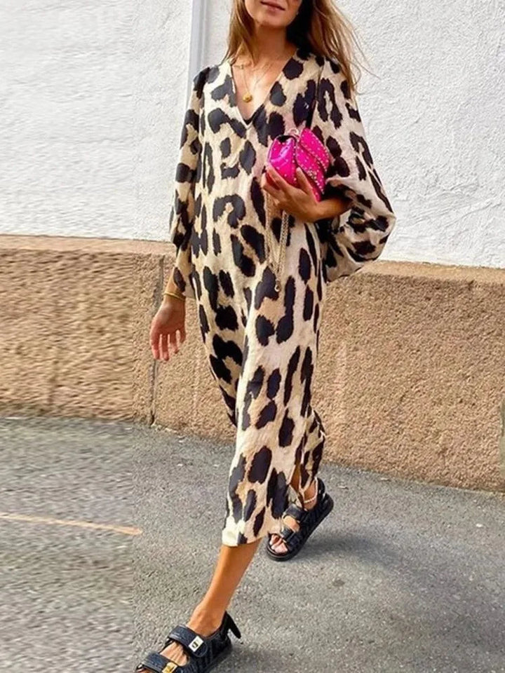 Elegant women's leopard print midi dress, ideal for sophisticated evening events.