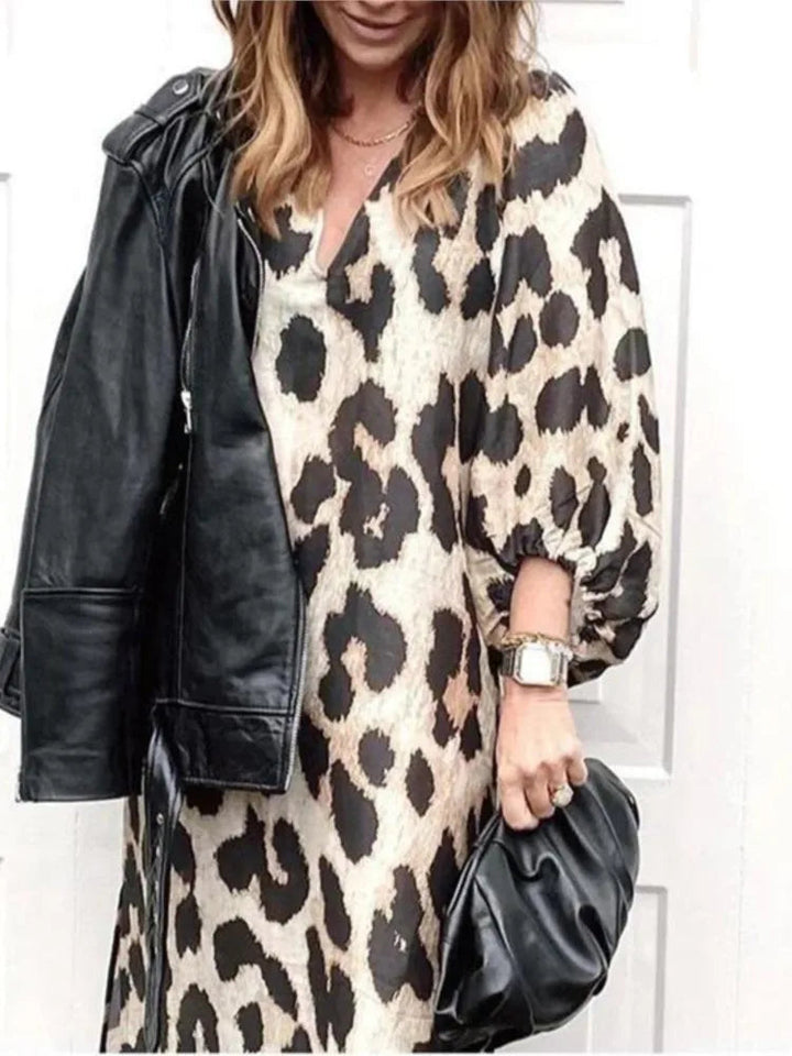 Versatile women's leopard print midi dress, easily styled from office to party.