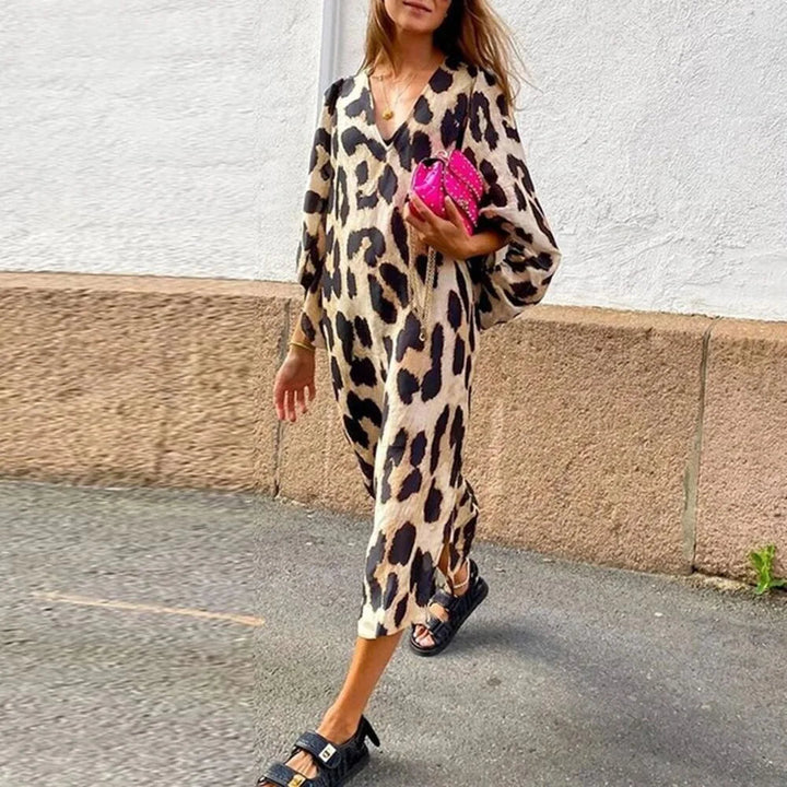 Stylish women's animal print midi dress, a comfortable and fashionable choice for any occasion.
