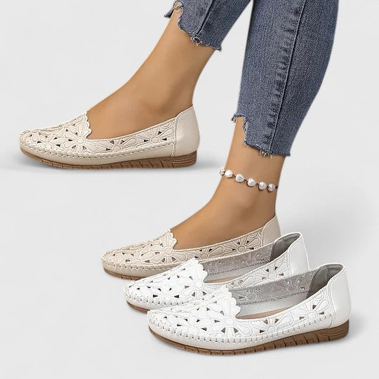 Stylish women's perforated loafers, perfect casual footwear for spring fashion.