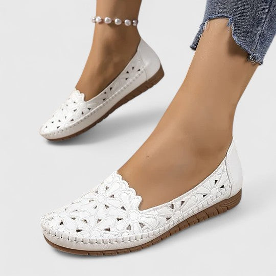 Breathable perforated women's flats, versatile slip-on loafers for everyday comfort.