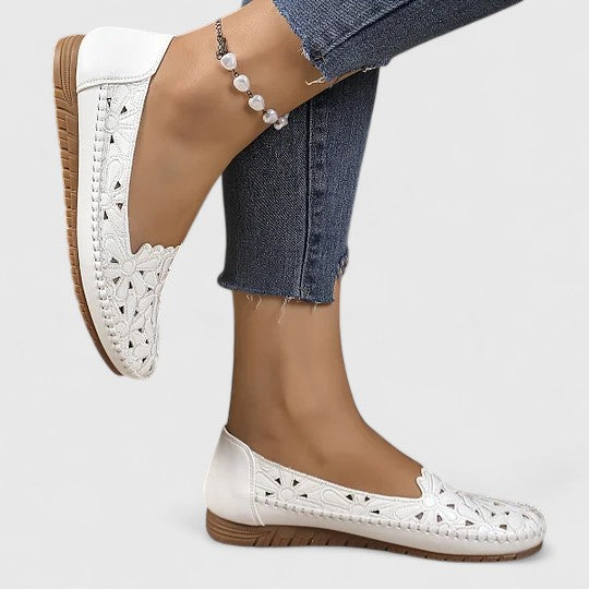 Versatile women's breathable flats, perforated slip-on loafers for casual and comfortable style.