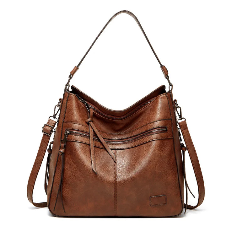 Elegant women's luxury genuine leather handbag, perfect for everyday chic style and versatility.