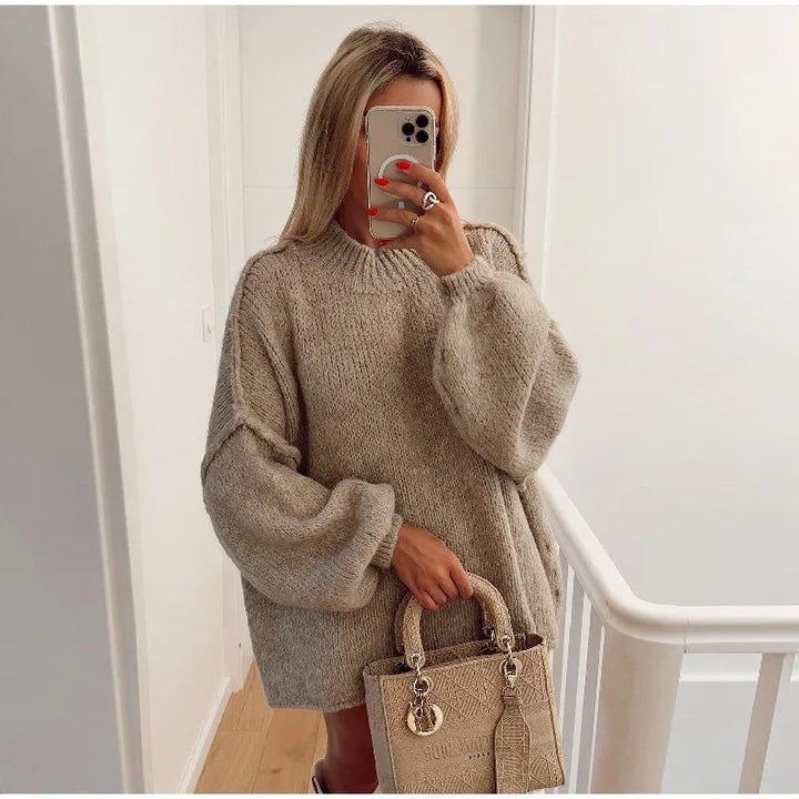 Comfortable women's fluffy oversized sweater, a warm essential for stylish winter fashion.