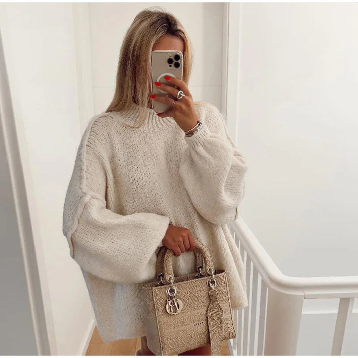 Relaxed fit women's oversized fluffy sweater, a cozy layering piece for ultimate comfort.