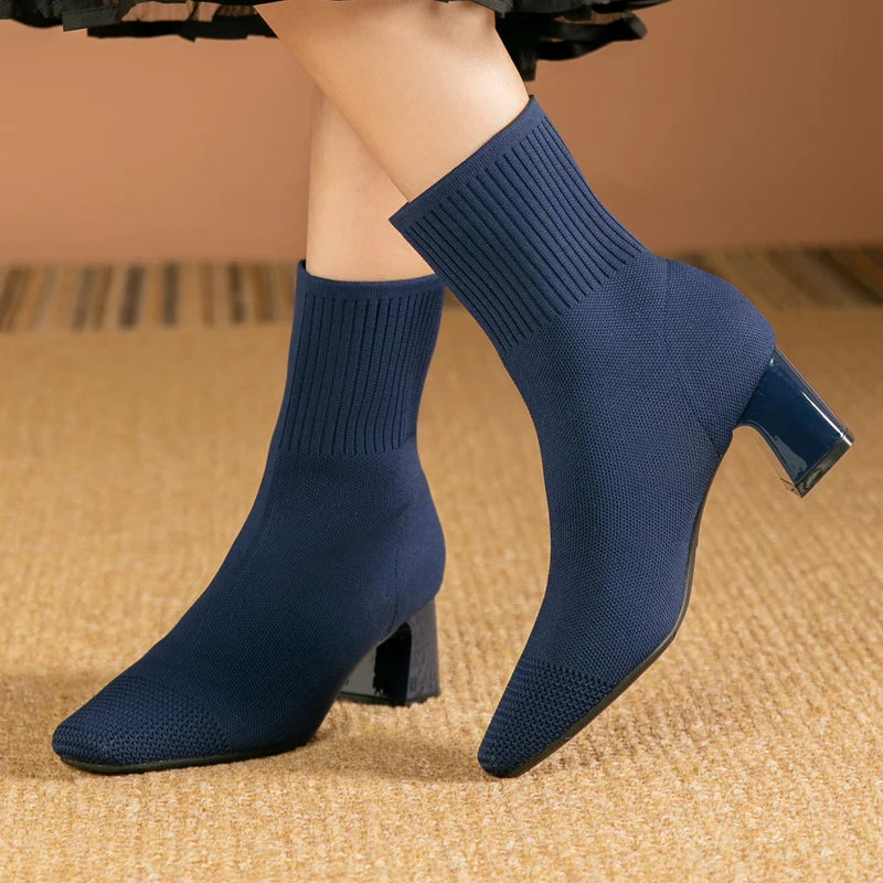 Elegant women's ankle boots, chic black leather, perfect for fall fashion & everyday versatile style.